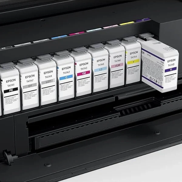 epson p900 printer top open showing ink cartridges violet cartridge is coming out
